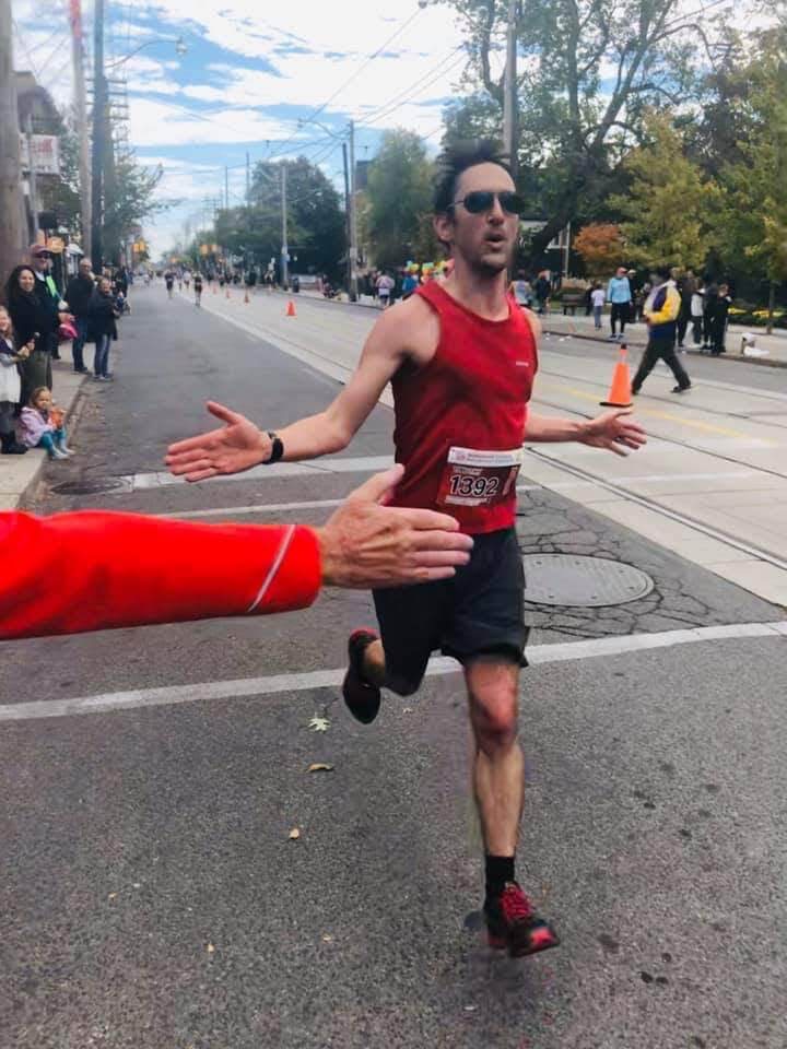 Timothy Fowler running a road race
